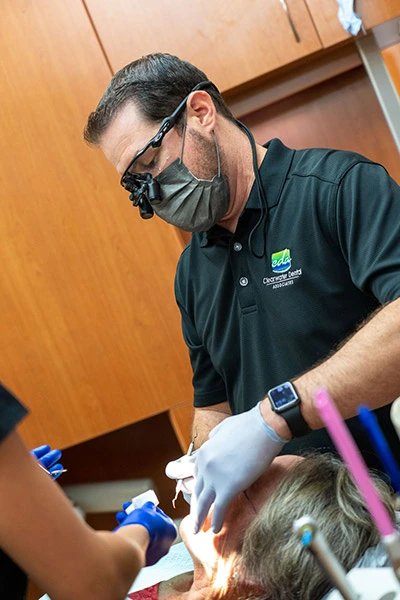 Dr. Burton working on a dental patient